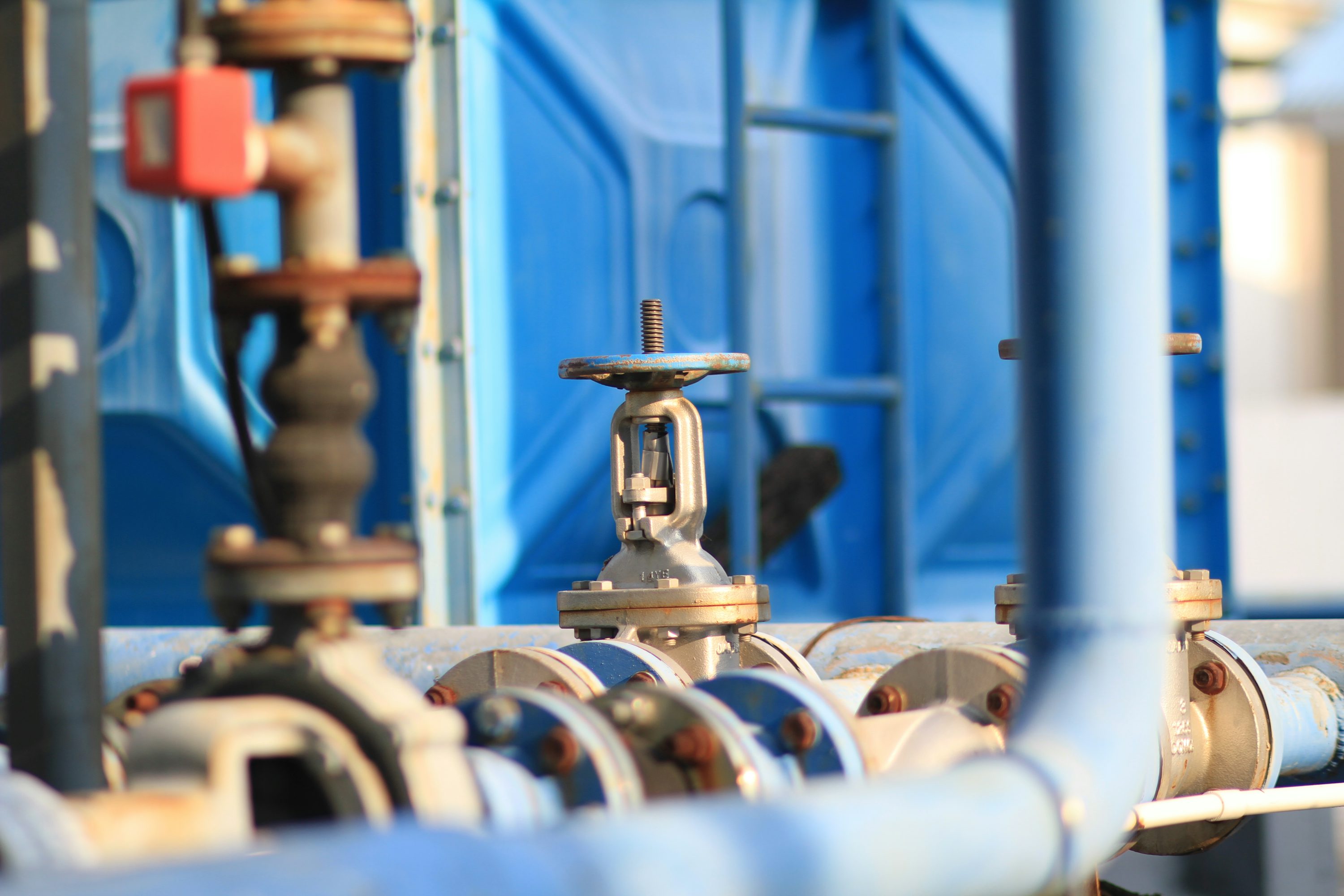 Industrial piping and valves in a factory
